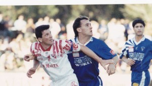 David playing for Sydney Olympic (in Blue) against Marshall Soper of the Parramatta Eagles (in White).