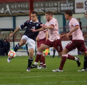 Dundee's Gavin Rae fires in a shot - Dundee v Raith Rovers - IRN BRU Scottish Football League First Division at Dens Park - © David Young - email: davidyoungphoto@gmail.com - - http://www.davidyoungphoto.co.uk